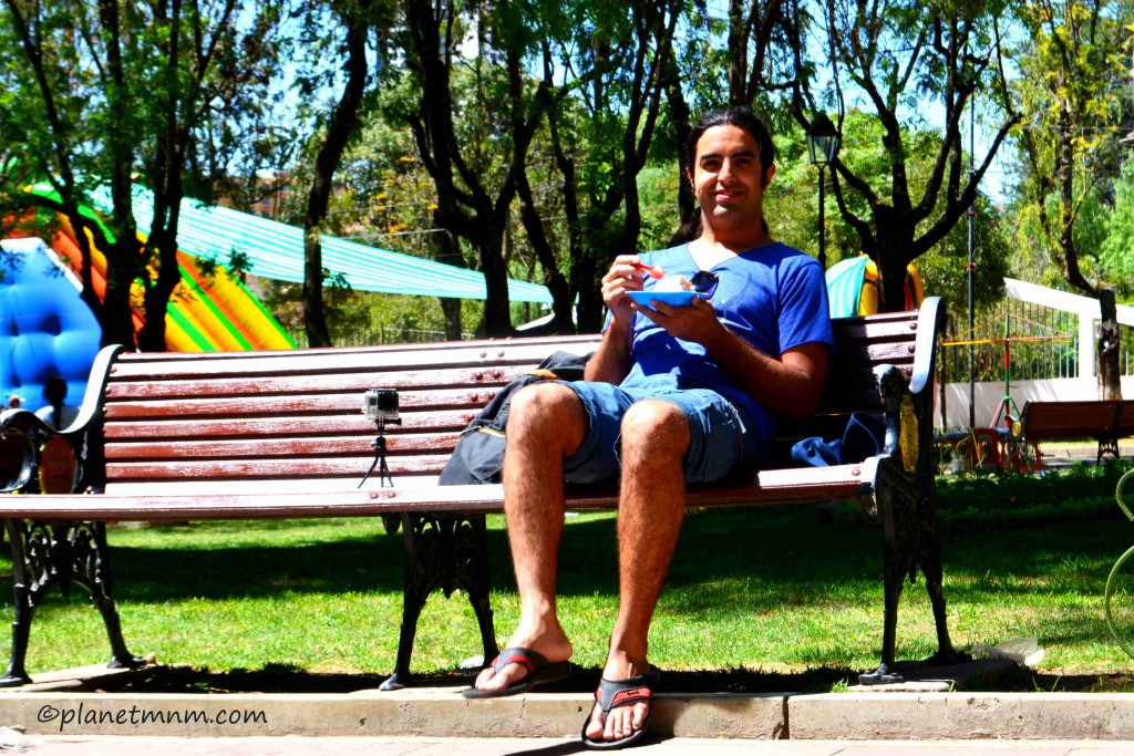 Enjoying a fresh cream cake in the central park in Sucre, Bolivia (10 Oct 2015)